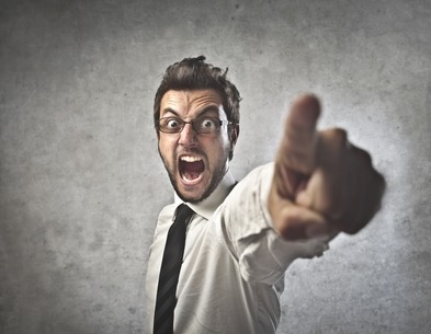 Businessman Yelling and Pointing - Workplace bullying